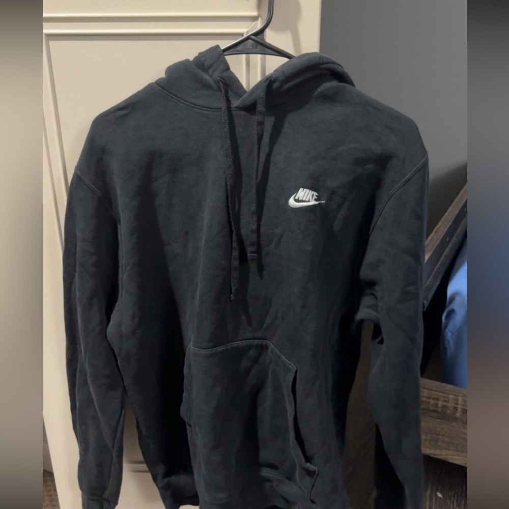 Black Nike hoodie.